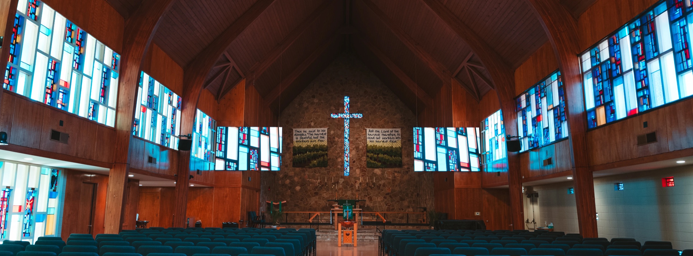 St. John's Lutheran Church sanctuary in Napa, CA with Altitude LED screens among the stained glass
