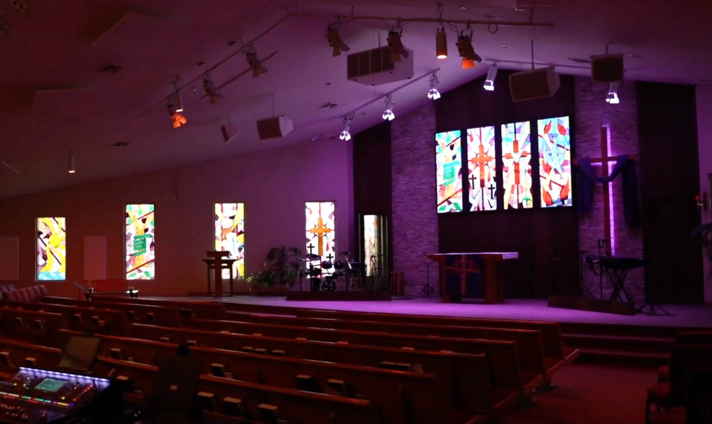 Trinity Church sanctuary in Genoa City, WI with stained glass and the Altitude Cloud LED wall